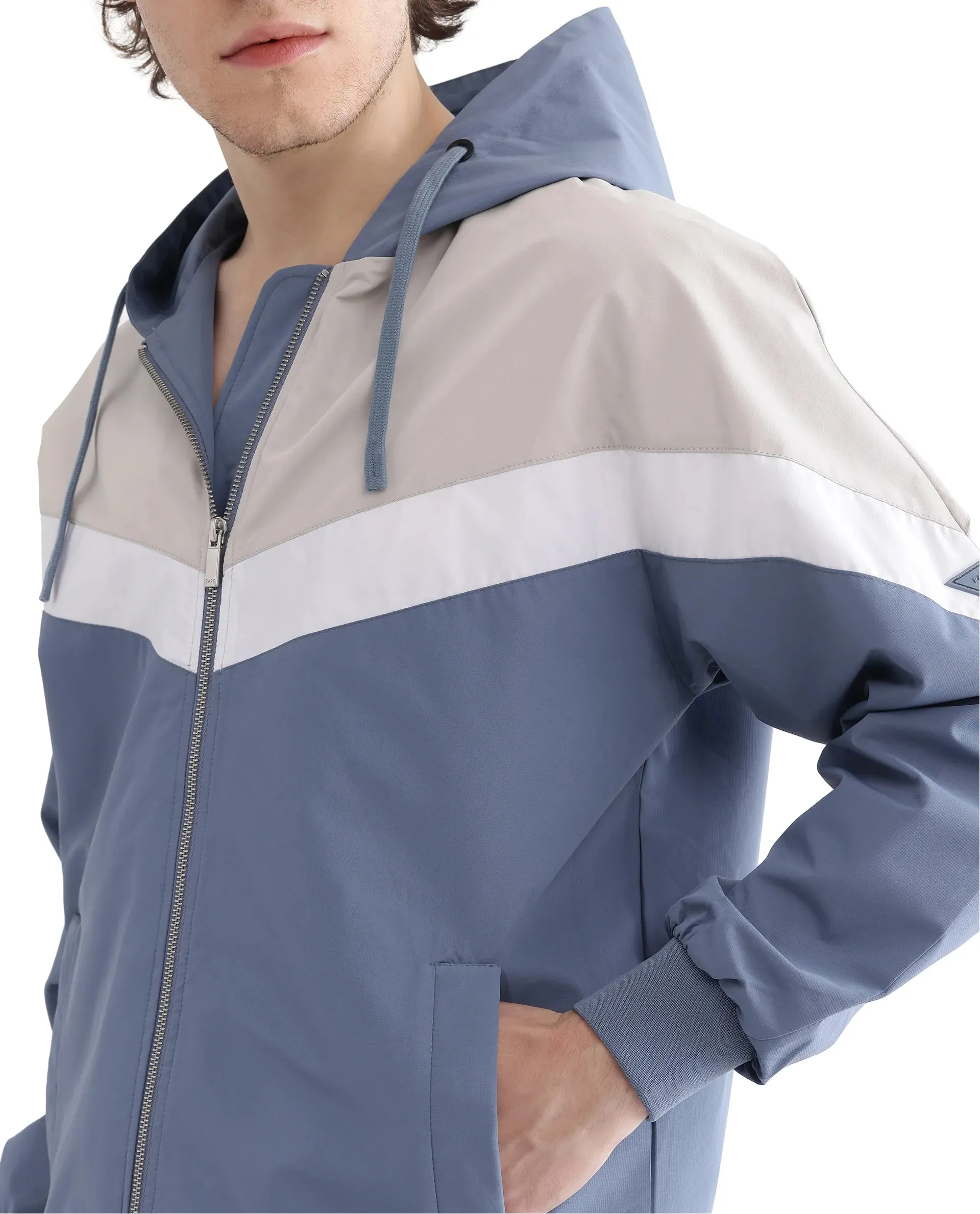 Rare Rabbit Men Waber Light Blue Polyester Fabric Full Sleeve Hooded Zipper Closure Cut and Sew Jacket